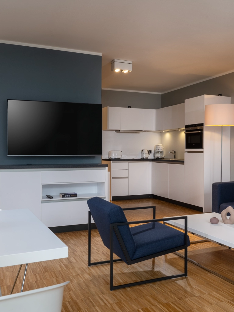 Apartment im Wavehotel Potsdam mit modernem Wohnbereich, TV und offener Küche